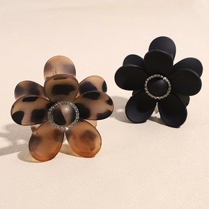 Sparkling rhinestone flower hair claw clips in tortoise shell and matte black finish