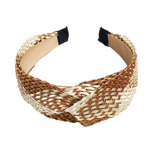 Bohemian woven knot headband with gold and brown fibers for a stylish look