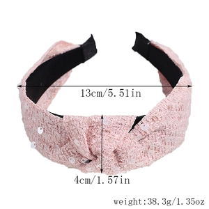Pink sequined knotted headband details including 13cm width and 38.3g weight specs