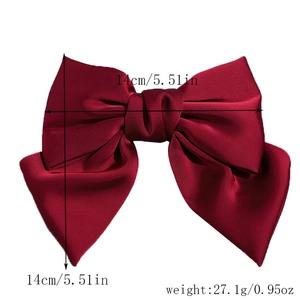 Detail view of the 14cm wine red satin bow hair clip showing exact size and weight metrics