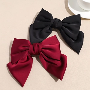 Elegant large satin bow hair clip set in classic black and wine red vintage style