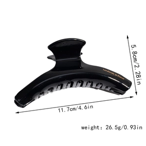 Detail view of large black French hair claw showing 11.7cm size and handmade lettering