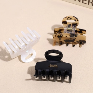 Three-piece French style square hair claws in pearl white, tortoiseshell, and black
