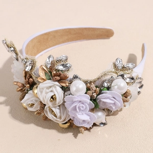 Detail of baroque headband with 3D fabric roses, pearls, and crystals on gold base