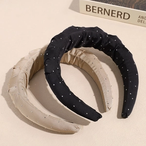 Serre-têtes rembourrés à strass en noir et champagne avec finition en tissu plissé