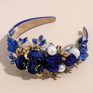 Detail of baroque headband with blue rhinestones, 3D fabric flowers and white pearls