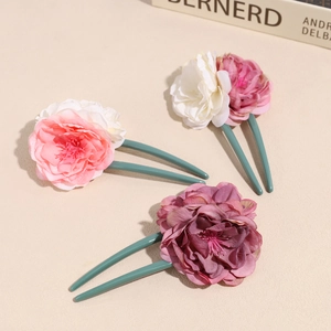 Three-piece fabric flower U-shaped hairpins in pink, red, and purple with green fork tips
