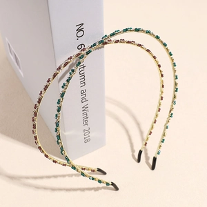 Slim crystal beaded headbands in green and red with gold metal frame and soft tips