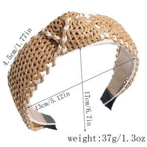 Detail showing dimensions and woven straw texture of a brown raffia knotted headband