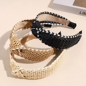 Three wide woven raffia headbands with cross knot design in black, beige and tan color