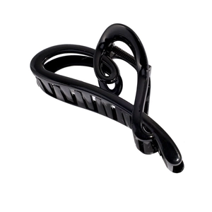 Glossy black heart-shaped hair claw clip with cutout design for elegant hairstyling