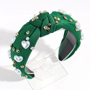 Cerchietto annodato verde scuro con perle a forma di cuore e strass luminosi