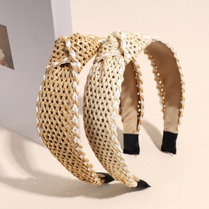 Minimalist wide raffia headband with twisted knot design in beige and camel colors