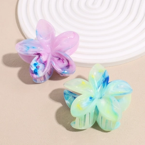 Floral hair claw clips with elegant marble pattern texture in pink and blue colors