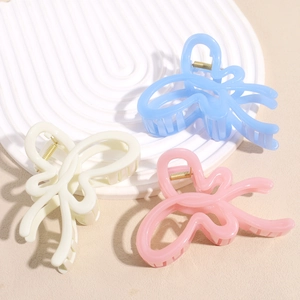 Three-piece jelly-colored butterfly hair clips set in blue, beige, and pink matte acrylic