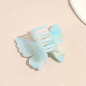 Elegant 3D blue gradient butterfly hair claw clip with golden glitter and resin finish