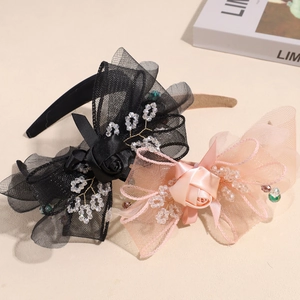 Elegant rose mesh hairbands with crystals in black and pink for a feminine style