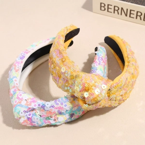 Cerchietti annodati con paillettes in giallo e colori macaron per acconciature da festa