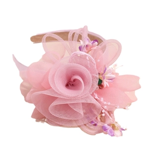 Serre-tête fleur en tulle rose avec strass brillants et design de rose multicouche