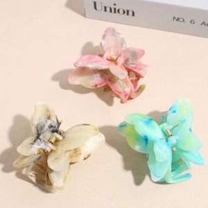 Pinces à cheveux papillon élégantes en marbre rose, beige et bleu avec ressorts