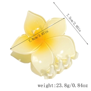 Detail view of yellow plumeria hair claw clip showing dimensions 7.8cm and 23.8g weight