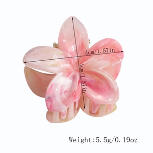 Dettaglio della molletta a fiore da 4cm con specifiche di peso di 5,5g per capelli