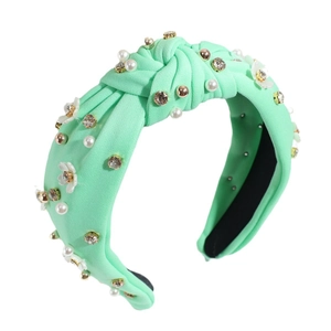 Cerchietto annodato verde menta con perle bianche, strass e decorazioni floreali