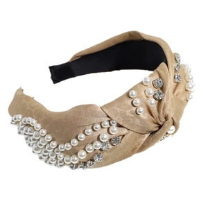 Serre-tête rembourré doré champagne orné de perles blanches et de strass étincelants