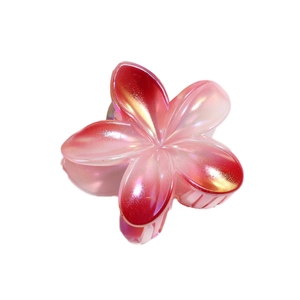 Pince à cheveux fleur de frangipanier avec dégradé de rouge et finition nacrée élégante