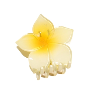 Large yellow frangipani hair claw clip made of resin for elegant summer hairstyles