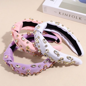Serre-têtes baroques luxueux avec strass en rose, violet et blanc, design noué chic
