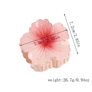 Detail view of pink flower hair claw clip with dimensions 7.5cm and weight 26.7g on white back
