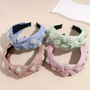Elegant knotted wide headband with pearl flower patterns and rhinestones in four soft colors
