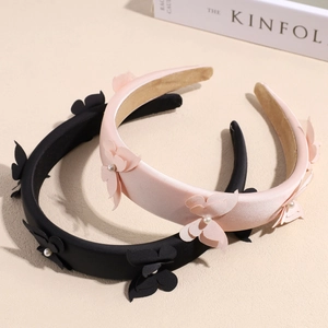 Elegant satin bow headbands in black and pink with pearl accents and 3D butterfly design