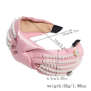 Detail view of pink knot headband with faux pearls and heart rhinestones showing dimensions