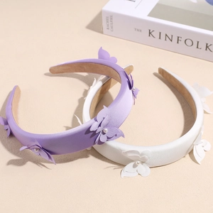 Elegant satin padded headbands with 3D butterfly and pearl accents in white and purple