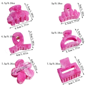 Detail view of pink marble claw clip set with precise size and weight measurements