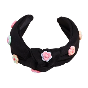 Serre-tête en tricot noir avec nœud et décorations florales 3D en résine pastel
