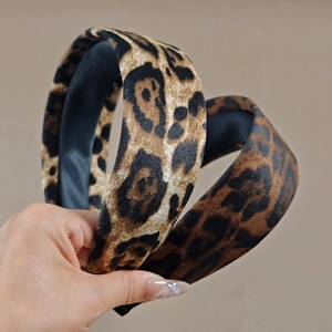 Leopard print wide headbands for women featuring soft velvet fabric in two stylish colors