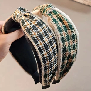 Knotted plaid headbands in green and black tweed fabric for stylish hair styling