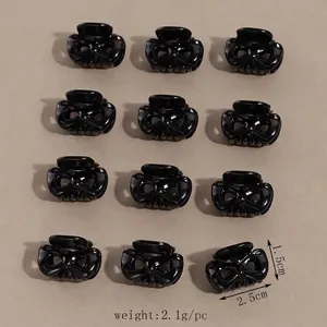 Set di 12 mini mollette per capelli nere con dettagli di dimensioni e peso