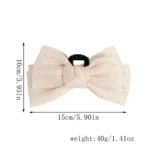 Detail shot of mesh bow hair claw with sparkling rhinestones and 15cm size measurement