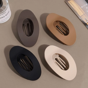 Lot de 4 pinces à cheveux ovales mates aux tons terreux pour une coiffure élégante de femme
