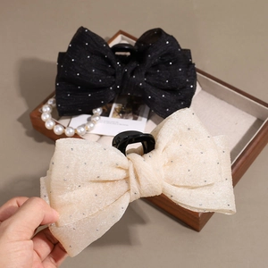 Elegant large bow hair claw clip with rhinestones in black and beige mesh fabric