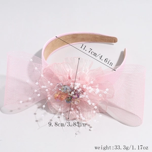 Pink floral mesh bow headband showing dimensions of 4.6 inches width and 3.85 inches flower