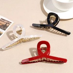 Elegant 12cm metal shark hair claw clips in red, black, and pearl white for women