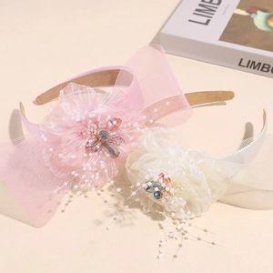 Elegant mesh flower headband with bow and pearls in pink and beige for party