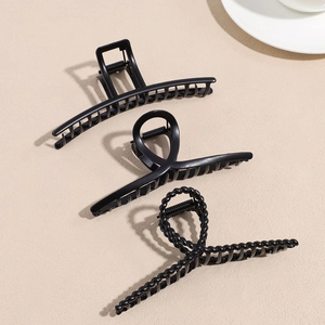 Set of three matte black geometric hair claws with square and twisted knot designs
