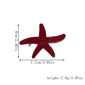 Detail view showing dimensions 7.7cm x 6cm and weight of the red starfish hair clip