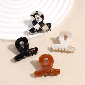 Set di 4 mini mollette per capelli in acetato con motivi a scacchi e leopardati